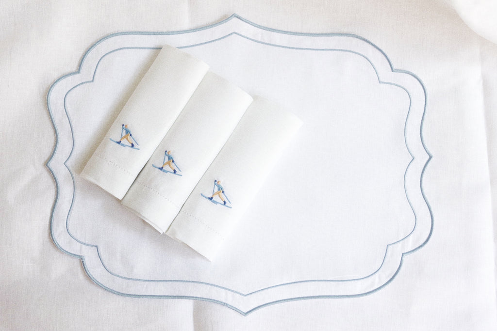 Individuales pico blancos con borde azul